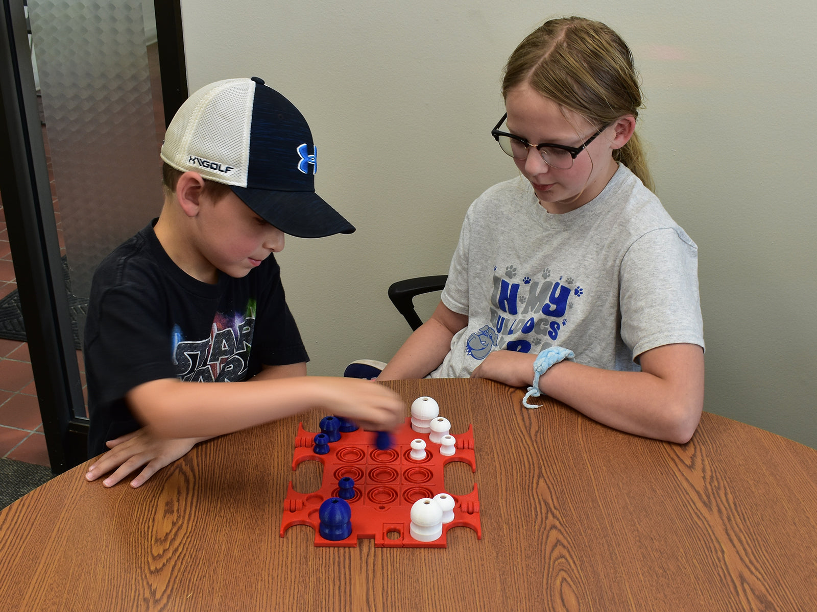 Kids playing Tic STACK Toe